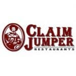 Miner with pickaxe in oval beside Claim Jumper name.