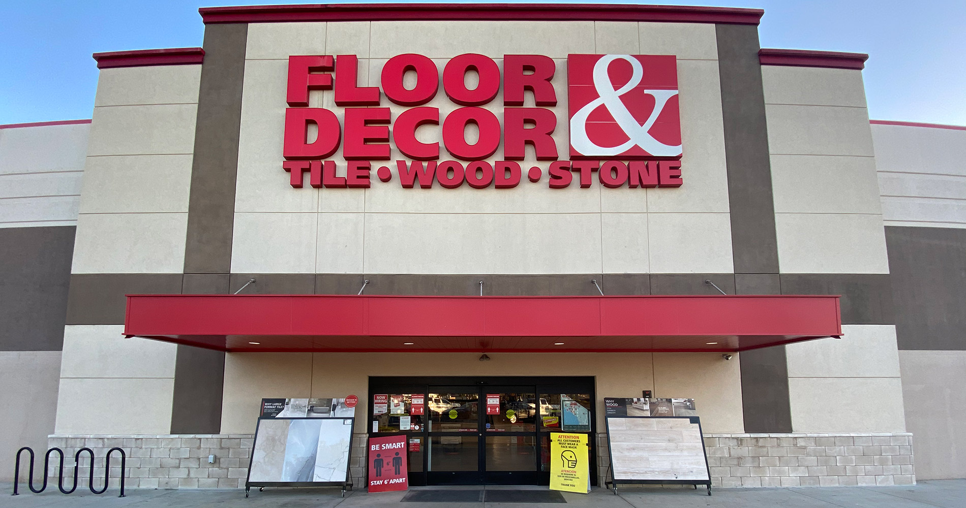 Floor & Decor storefront with large FLOOR & DECOR sign above entrance.