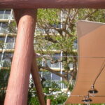 Pergola with canopy and hanging lights.